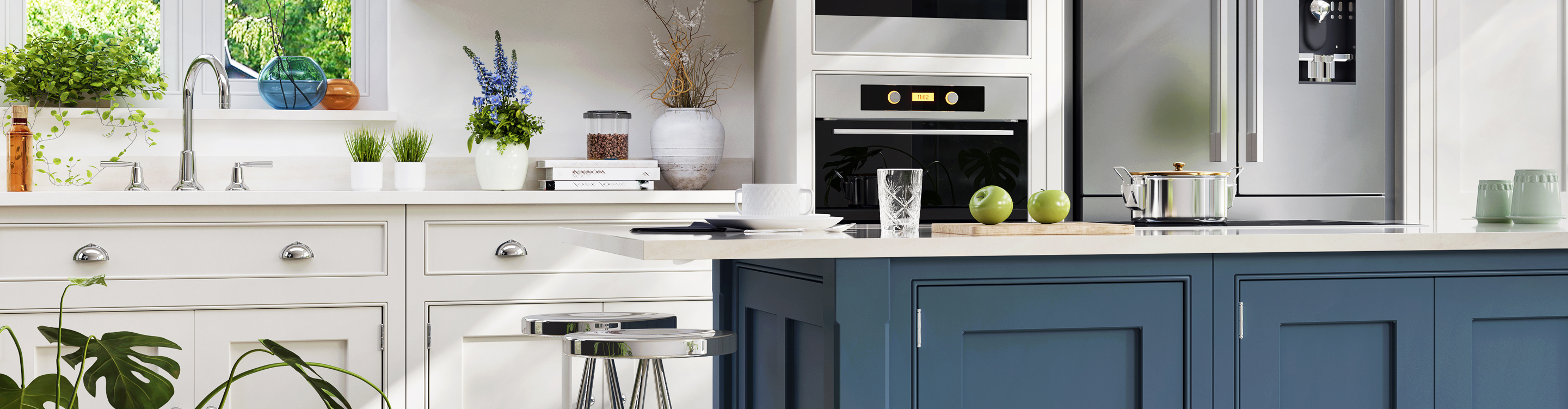 White kitchen with white cabinets and an island with blue cabintry 