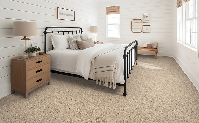 beige carpet in warm minimalist bedroom